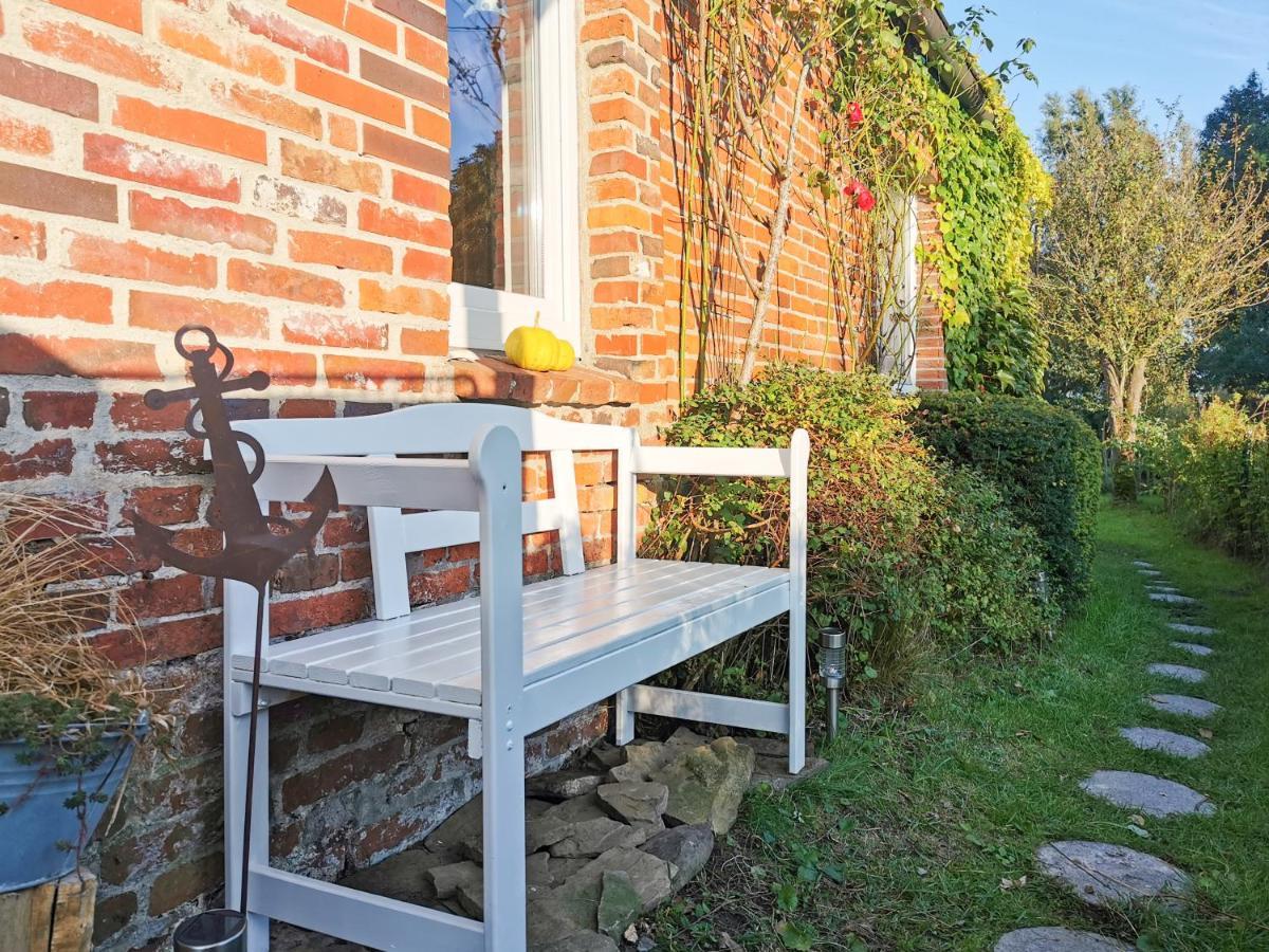 Ferienglueck An Der Nordsee Buche Deine Erdgeschoss-Ferienwohnung Mit Kamin Terrasse Und Eingezaeuntem Garten Fuer Unvergessliche Auszeiten Altfunnixsiel Exterior foto